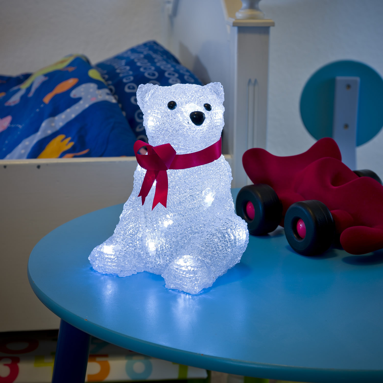 LED ALED Acryl polar bear, sitting with red ribbon